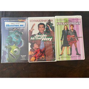 3 children's family VHS tapes Monsters Inc. , Jingle all the way, Freaky Friday